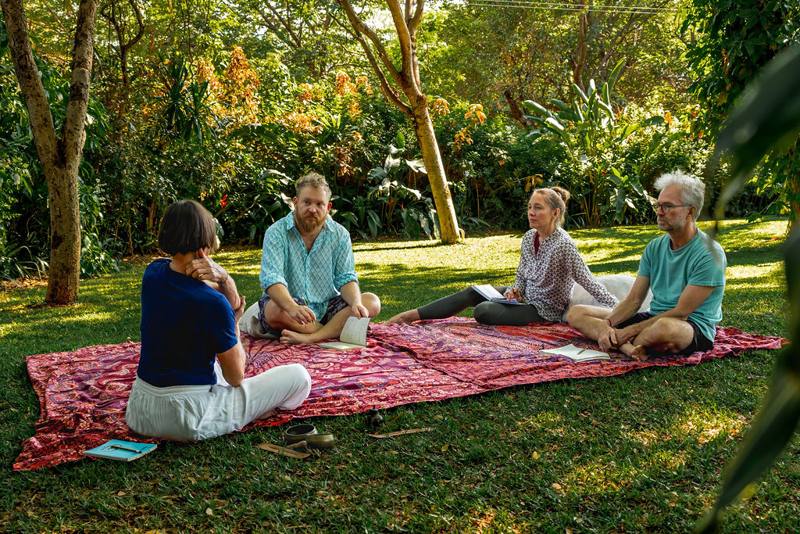 A small group gathered on the lawn