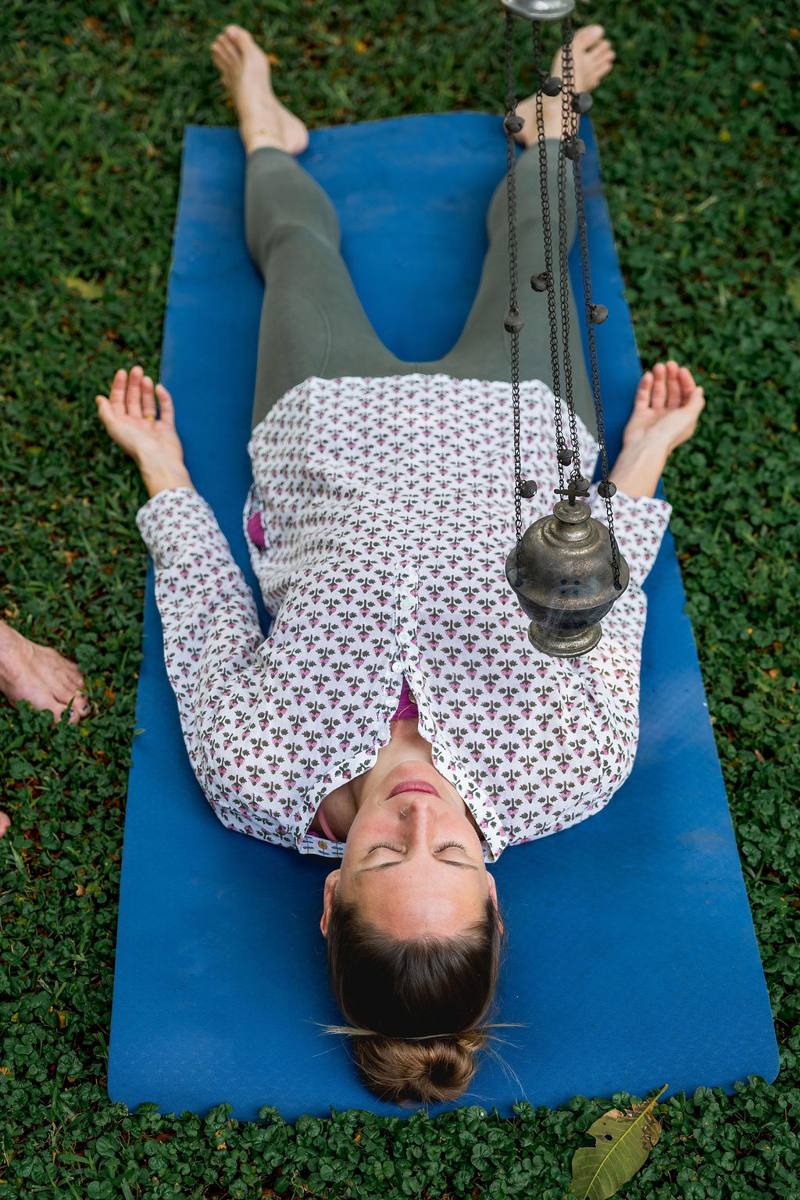 Incense burner held above a guided relaxation